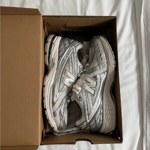 New Balance Metallic Silver and White Sneakers